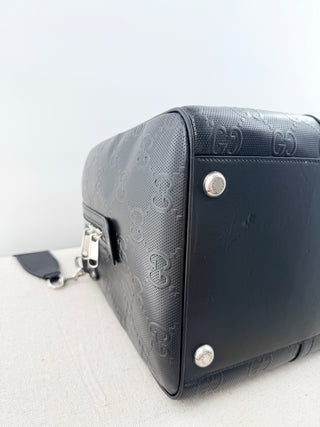 Gucci leather GG embossed jumbo duffle bag with strap