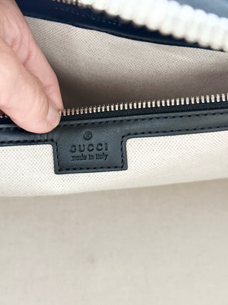 Gucci leather GG embossed jumbo duffle bag with strap