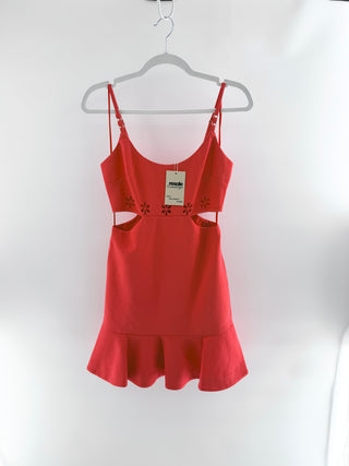 Likely mini dress featuring scoop neckline, floral laser-cut waist detailing, and flattering side cutouts, 2