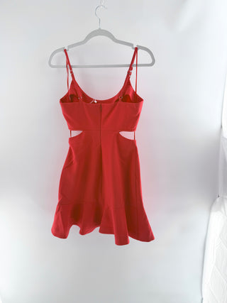 Likely mini dress featuring scoop neckline, floral laser-cut waist detailing, and flattering side cutouts, 2