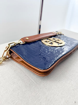 Tory Burch large patent leather log reva clutch bag