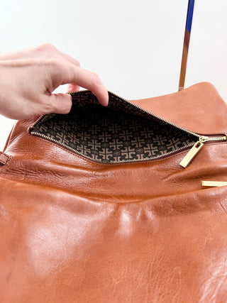 Tory Burch large patent leather log reva clutch bag