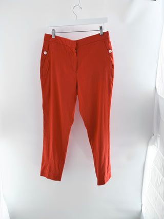Rag and Bone tailored cropped trousers crafted in lightweight linen-blend fabric, features mid-rise waist, tapered leg, front slash pockets with button-tab accents, 4
