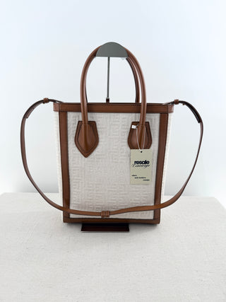 Balmain logo tote bag crafted from jacquard canvas featuring signature tonal monogram pattern, accented with smooth cognac leather trim, dual rolled top handles and detachable shoulder strap