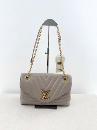 Louis Vuitton quilted leather bag with XL clasp and chain strap