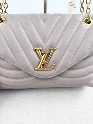Louis Vuitton quilted leather bag with XL clasp and chain strap