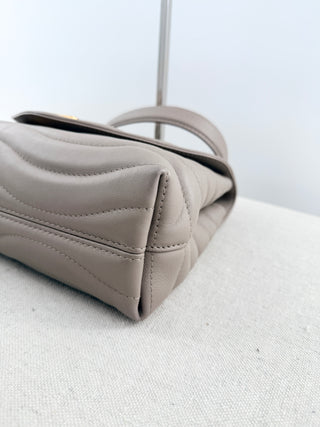 Louis Vuitton quilted leather bag with XL clasp and chain strap