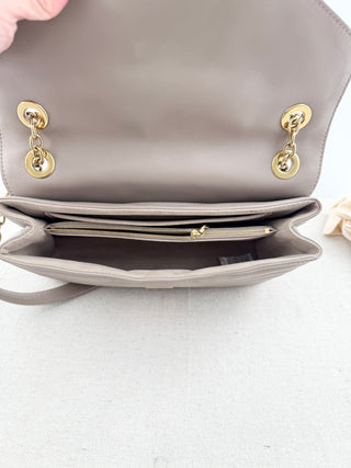 Louis Vuitton quilted leather bag with XL clasp and chain strap
