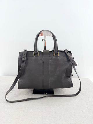 YSL cabas chyc leather tote featuring iconic gold-tone Y hardware, dual rolled top handles, expandable side gussets