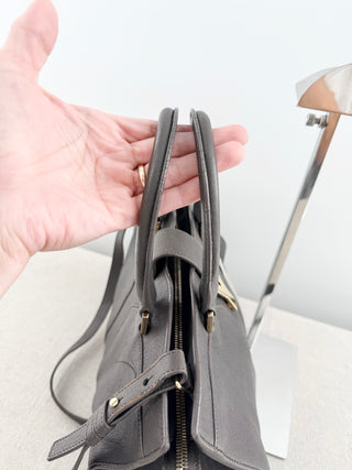 YSL cabas chyc leather tote featuring iconic gold-tone Y hardware, dual rolled top handles, expandable side gussets