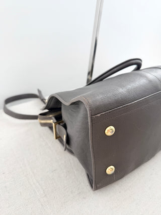 YSL cabas chyc leather tote featuring iconic gold-tone Y hardware, dual rolled top handles, expandable side gussets