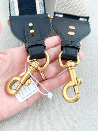 Christian Dior logo embroidered adjustable shoulder strap featuring iconic "Christian Dior Paris" logo woven throughout