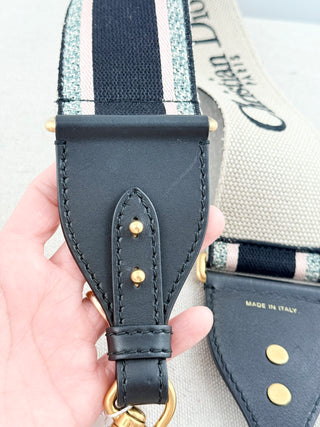 Christian Dior logo embroidered adjustable shoulder strap featuring iconic "Christian Dior Paris" logo woven throughout