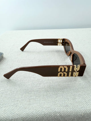Miu Mu SUM 11 VS sunglasses