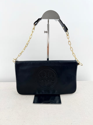 Tory Burch large flap reva clutch bag with embossed logo and short chain