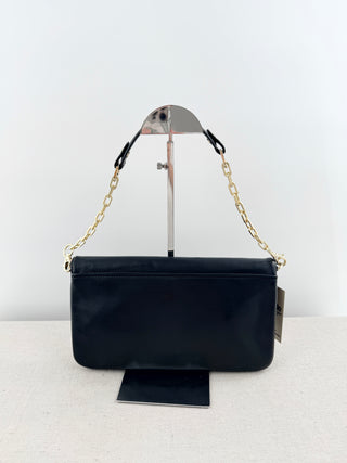 Tory Burch large flap reva clutch bag with embossed logo and short chain