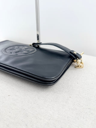 Tory Burch large flap reva clutch bag with embossed logo and short chain