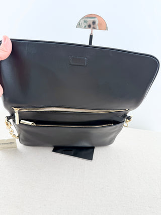Tory Burch large flap reva clutch bag with embossed logo and short chain