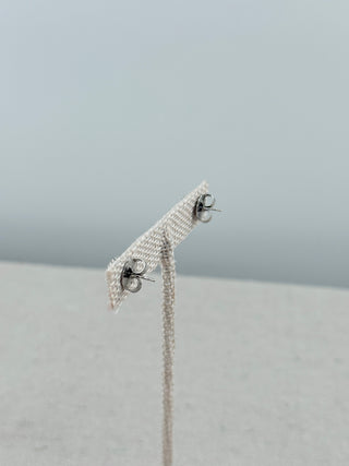 David Yurman sterling silver pave cable dome stud earrings featuring sparking pave diamond center framed by David Yurmans iconic cable-twist detailing