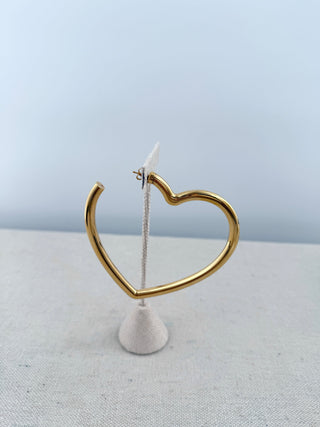 Balenciaga oversized heart-shaped hoop earring crafted in gold-tone metal