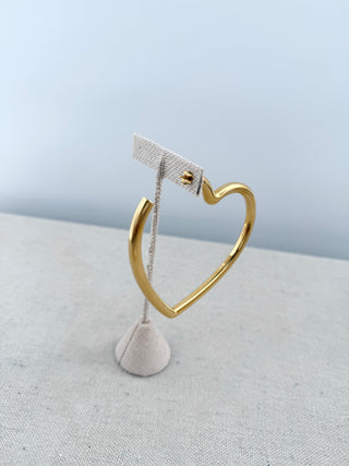Balenciaga oversized heart-shaped hoop earring crafted in gold-tone metal