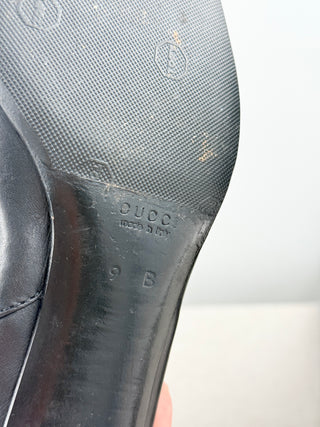 Gucci mid calf leather boots with buckle, black