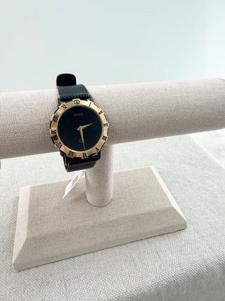 Gucci vintage watch 3000 black dial gold plated roman numeral bezel
