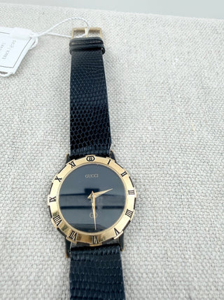 Gucci vintage watch 3000 black dial gold plated roman numeral bezel