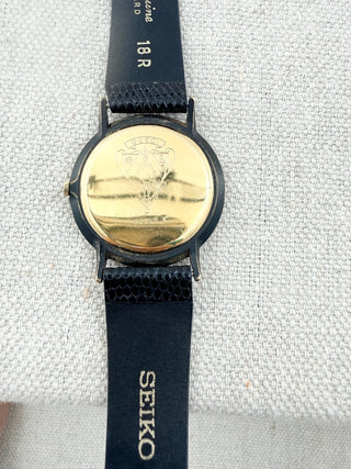 Gucci vintage watch 3000 black dial gold plated roman numeral bezel