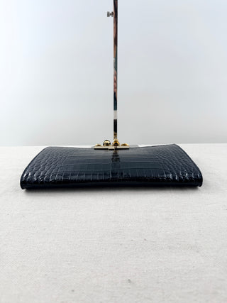 Alexander McQueen crocodile embossed large clutch  with knuckle duster handle