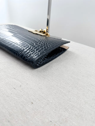 Alexander McQueen crocodile embossed large clutch  with knuckle duster handle