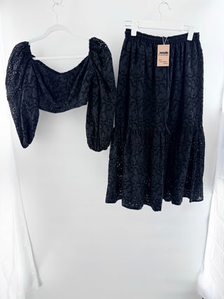 kynah two-piece set in eyelet fabric featuring an off-shoulder crop top with voluminous puff sleeves paired with high-waisted tiered midi skirt, S