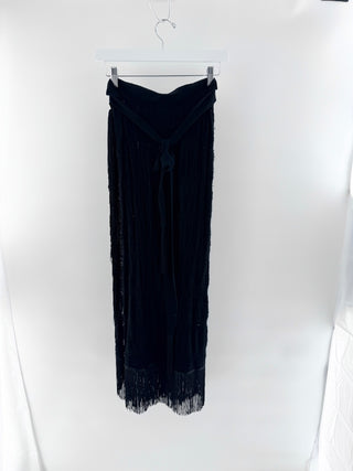 House Of Harlow knit midi skirt crafted in  a textured open-weave design with flattering wrap silhouette and statement fringe hem, M