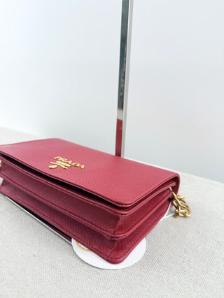Prada Small leather cross body with saffiano leather and gold chain hardware