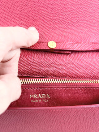 Prada Small leather cross body with saffiano leather and gold chain hardware