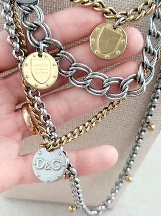 Dolce and Gabbana tiered 4 strand necklace with DG logo coin embossing