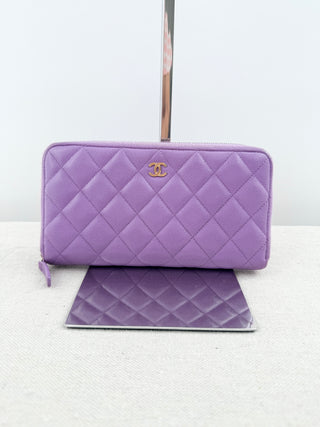 Chanel large zip up wallet in caviar leather quilted