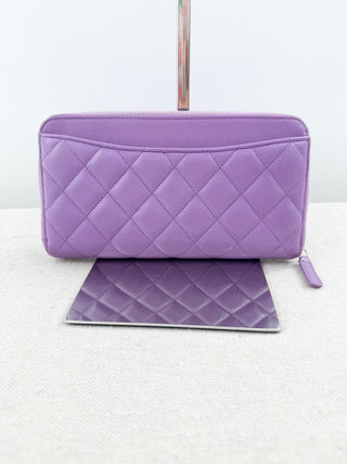 Chanel large zip up wallet in caviar leather quilted