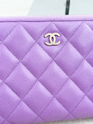 Chanel large zip up wallet in caviar leather quilted
