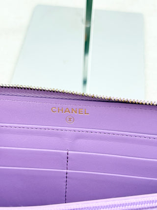 Chanel large zip up wallet in caviar leather quilted