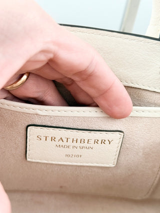 Strathberry leather nano tote bag with metallic bar and chain strap