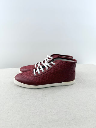 Gucci high top logo embossed leather sneakers, 39.5