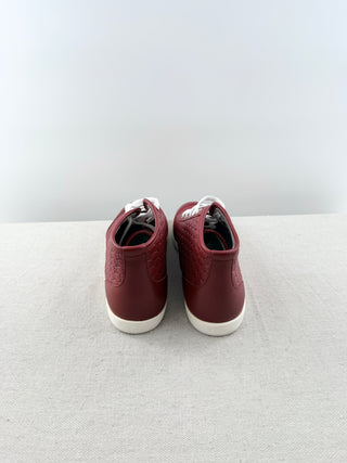Gucci high top logo embossed leather sneakers, 39.5