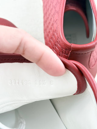 Gucci high top logo embossed leather sneakers, 39.5