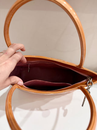 Chanel CC logo quilted patent leather top handle bag