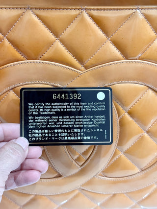 Chanel CC logo quilted patent leather top handle bag