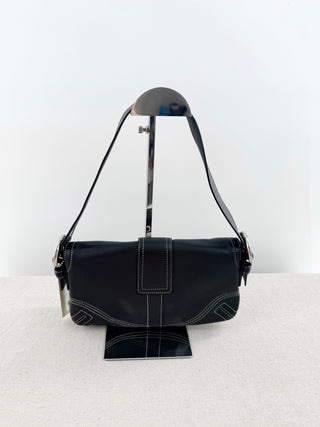 Coach leather shoulder bag with large buckle