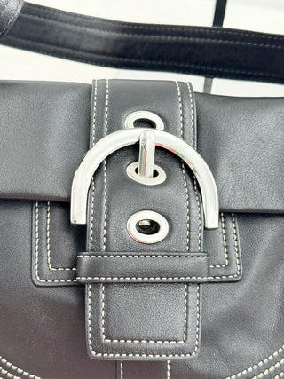 Coach leather shoulder bag with large buckle