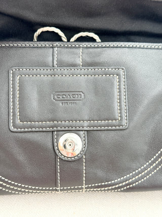 Coach leather shoulder bag with large buckle