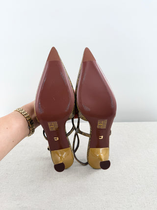 Lola Cruz snake-print slingback kitten heels featuring pointed toe, side cutout detailing, and adjustable slingback strap, 39